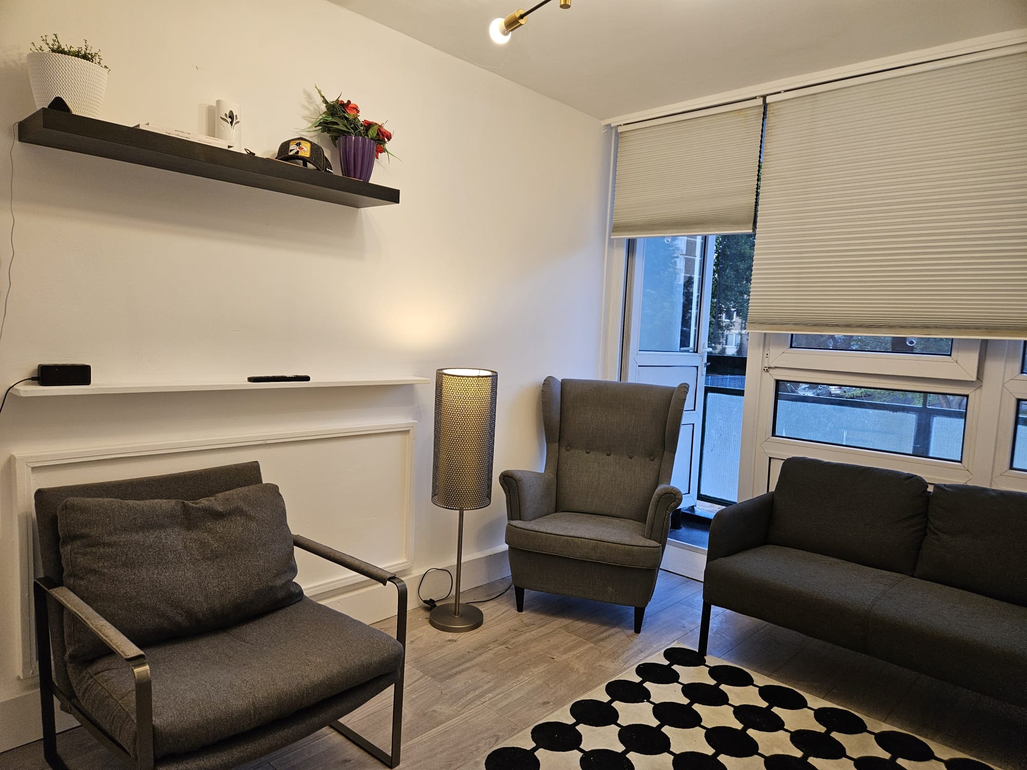 Living room at The Arlington with calm, modern finishes